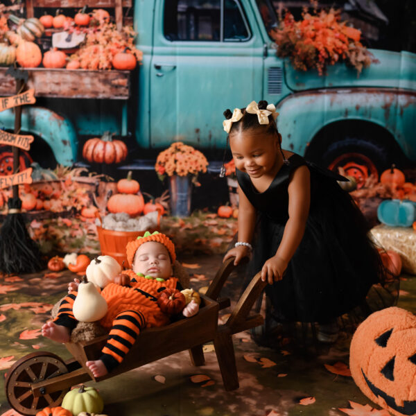 My baby is celebrating a halloween at moments baby photography.